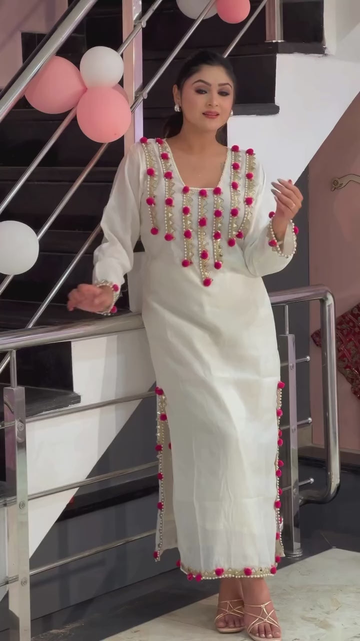 Ivory Hand-Embellished Kurta Set with Pink Tassel Detailing
